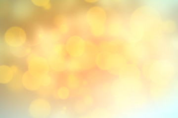 Yellow blurred bokeh abstract lights background,golden backdrop.