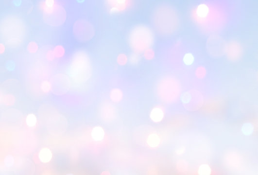 Soft violet blue blurred bokeh abstract glowing lights background.