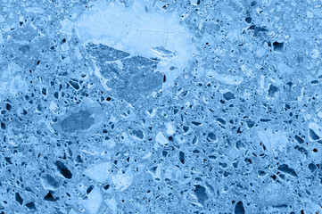 Blue stone texture, stucco wall pattern for background. Brick and stone creative texture and pattern for design and decoration. Trendy color of the year 2020.