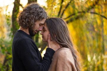 Happy couple outdoors. Outdoor portrait of romantic couple in love. Full of happiness. 