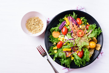 Healthy vegetables salad with quinoa seed, top view