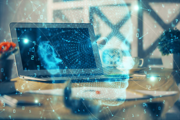 Double exposure of work table with computer and brain sketch hologram. Brainstorming concept.