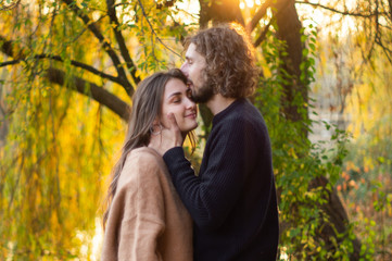 Happy couple outdoors. Outdoor portrait of romantic couple in love. Full of happiness. 