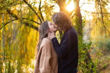 Fototapeta premium Happy couple outdoors. Outdoor portrait of romantic couple in love. Full of happiness. 