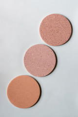 Round coasters made of artificial stone tabletop. Food stand.	