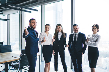 Fototapeta premium Excited business team in modern office