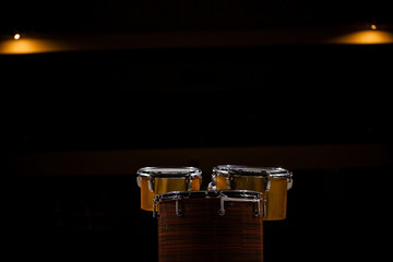  musical drums on stage under stage light against a background of light, ethnic music, live performance