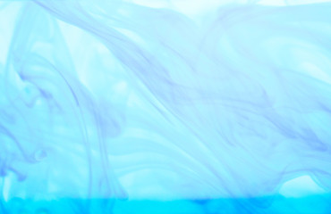 Blue ink dissolved in water.