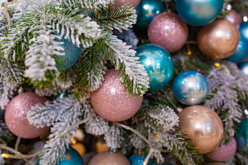 Fototapeta na wymiar Colorful decoration of Christmas tree. pastel colors Balls