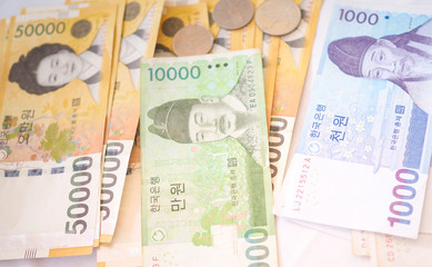 Korean won notes and Korean won coins for money concept background