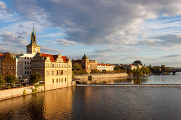 Fototapeta na wymiar Bedrich Smetana Museum and embankment across the Vltava River in Prague