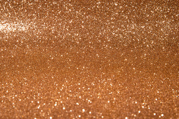 Gold blured sparkling background. Christmas lights.