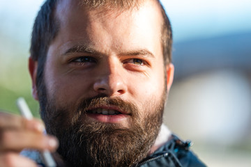 Fototapeta premium Male Portrait with a cigarette