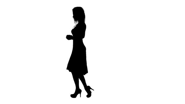 Black silhouette of talking women. Computer Animation. Alpha channel. Alpha matte. FullHD.