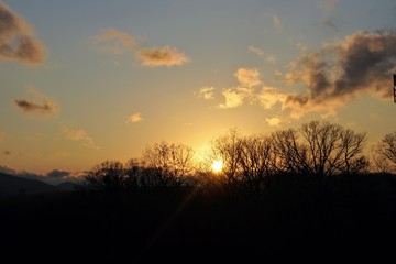 Sunset Over the Blue Ridge Mountain in Autumn with Leafless Trees