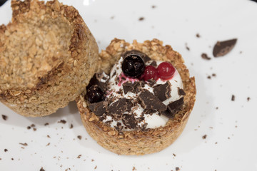 Homemade recipe made with oat flakes and natural yogurt filling, berries. Delicious and healthy breakfast snack preparation