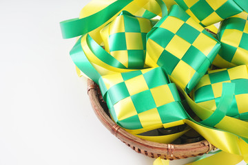 Colourful ketupat plastic ribbon decoration for eid mubarak celebration.