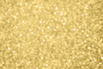 Abstract blur gold glitter sparkle defocused bokeh light background
