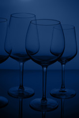 Wine glasses on blue