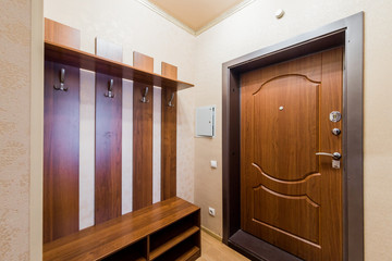 Russia, Omsk- August 02, 2019: interior room apartment. standard repair decoration in hostel. corridor, hallway, doors