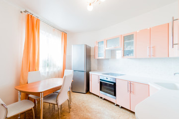 Russia, Omsk- August 02, 2019: interior room apartment. standard repair decoration in hostel. kitchen, dining area