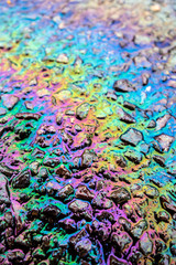 Fototapeta premium Petrol Oil Pollution Rainbow Gasoline Leak on Pavement