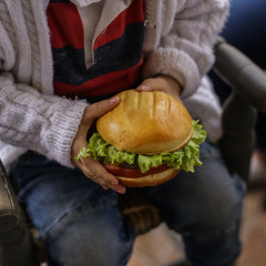 burger in hands