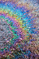 Petrol Oil Pollution Rainbow Gasoline Leak on Pavement