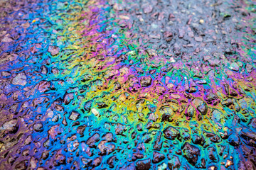 Fototapeta premium Petrol Oil Pollution Rainbow Gasoline Leak on Pavement