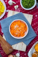 Carrot style with sesame seeds on top.