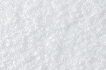 Background of fresh snow closeup with white snowflakes