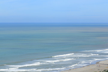 The waves and blue sea view from Parangtritis beach to Parangkusumo beach seen from above are an attraction for tourists coming to Yogyakarta