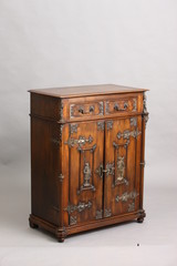 Antique French walnut cabinet with expertly crafted bronze plates