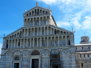 Fototapeta premium View of the Pisa Cathedral (Duomo di Pisa) in Pisa, Italy. It is located in Miracoli Square (Piazza dei Miracoli).