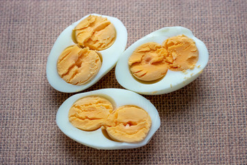 boiled egg isolated on brown background cutout.easter