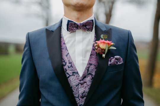 groom wearing a bow tie
