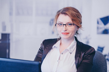 isolated photo: portrait of smiling handsome businesswoman in glasses. concept of healthy eyes, vision, professional skills