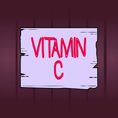 Writing note showing Vitamin C. Business concept for it promotes healing and helps the body absorb iron Ascorbic acid Wooden plank slots grooves wood panel colored board lumber