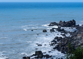 Long exposure of waves crashing on rocks, coastline of Northern California