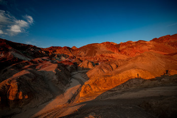 Fototapeta na wymiar Sunsuet at Artist'a Palette Point in Death Valley National Park