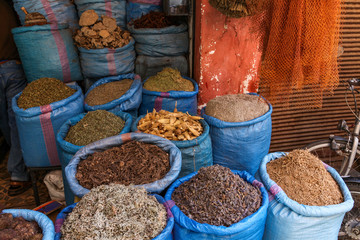 Bags of dried herbs and spices for sale