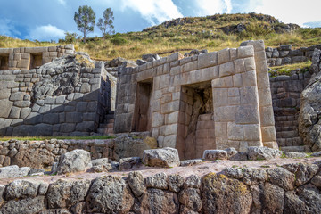 Fototapeta na wymiar Peru - Inca Masonry Bulding Ruins at the Water Temple Tambomachay Set in Mountains outside Cuzco