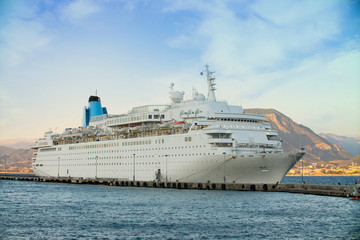 Fototapeta na wymiar Beautiful white giant luxury cruise ship
