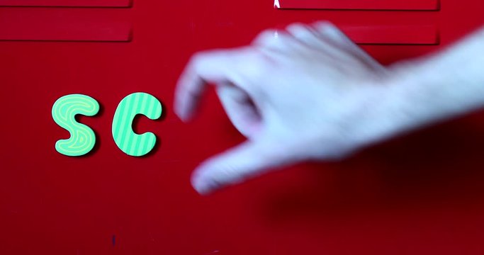 The Word School Written With Magnet Letters. Close Up Shot - DCi 4K Resolution