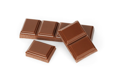 Dark chocolate pieces isolated on white background