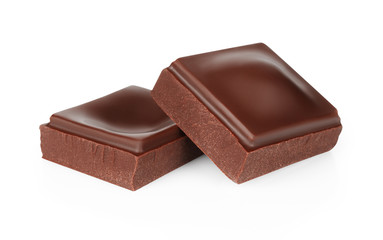 Dark chocolate pieces isolated on white background