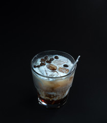  This is a cocktail with coffee on a black background.