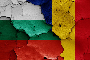 flags of Bulgaria and Romania painted on cracked wall