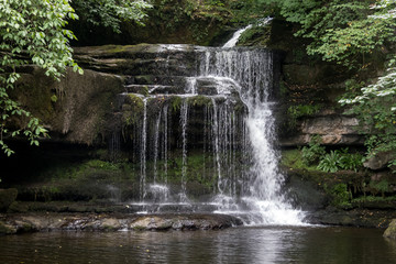 Fototapeta na wymiar View of Cauldron Force at West Burton in The Yorkshire Dales National Park