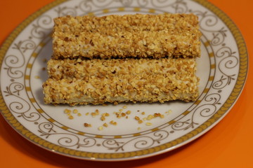 tubes in nuts on a white plate